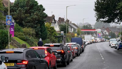 Long queues have formed at petrol stations across the UK. PA
