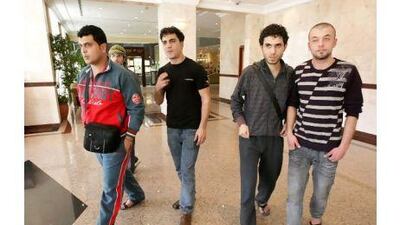 Mohammed al Khatib, Hani abu Sha'ar, Ghassan Shakshak and Ghassan Salem have been stranded at Dubai airport for more than a month.