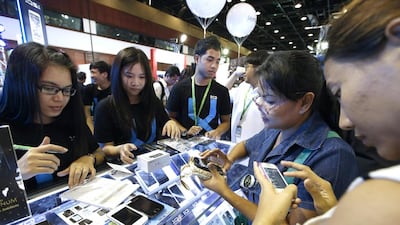 Research found that on a 2G network the cheaper handsets were much better at picking up weak signals compared to newer smartphone handsets. Rungroj Yongrit / EPA