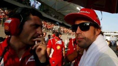 Fernando Alonso, right, has been remarkably confident despite Ferrari being unable to provide him with a faster car. Suhaib Salem / Reuters