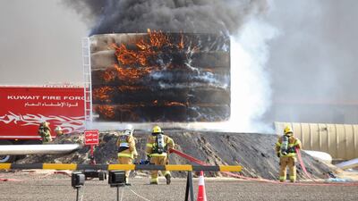 The Kuwaiti fire service, national guard, civil defence and members of the army take part in the Shamel 7 fire drill in the Arifjan area, 65km south of Kuwait City. AFP