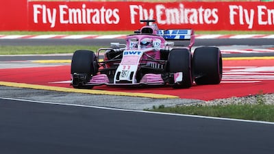 Force India's driver Sergio Perez is reportedly owed money by the team. AFP