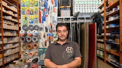 Syrian refugee Noureldin Moutaweh, 45, from eastern Ghouta, Syria, speaks during an interview as he works inside in a hardware store in Beirut, Lebanon. Noureldin Moutaweh, owner of a mobile shop in Syria, now working in a hardware store that is not related to his previous field of work but to be able to support his family which consists of his wife and 7 daughters. World Refugee Day is marked annually on 20 June. According to the UNHCR, more and more refugees today live in urban settings outside refugee camps. EPA