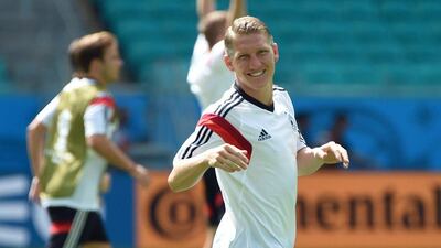 Germany midfielder Bastian Schweinsteiger takes part in a training session on Sunday ahead of Germany's 2014 World Cup Group G opener against Portugal on Monday. Patrik Stollarz / AFP / June 15, 2014