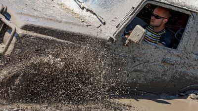 A driver tackles the course. EPA