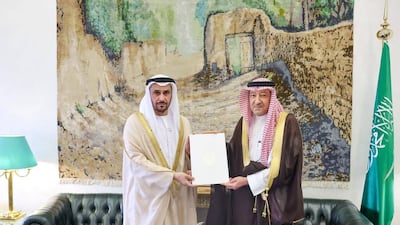 Matar Salem Al Dhaheri presents the letter to Waleed Al Khereiji during a reception in Riyadh. Photo: Wam