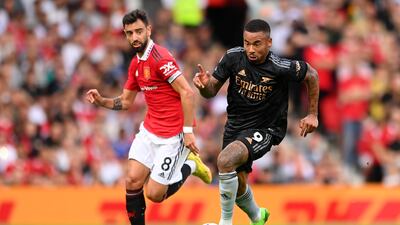 MANCHESTER, ENGLAND - SEPTEMBER 04: Gabriel Jesus of Arsenal is challenged by Bruno Fernandes of Manchester United during the Premier League match between Manchester United and Arsenal FC at Old Trafford on September 04, 2022 in Manchester, England. (Photo by Michael Regan / Getty Images)
