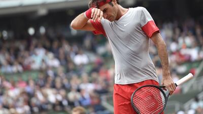 Switzerland's Roger Federer on his way to defeat against Latvia's Ernests Gulbis at the Roland Garros stadium in Paris on June 1, 2014. AFP
