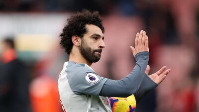 Soccer Football - Premier League - AFC Bournemouth v Liverpool - Vitality Stadium, Bournemouth, Britain - December 8, 2018 Liverpool's Mohamed Salah applauds fans after the match Action Images via Reuters/Matthew Childs EDITORIAL USE ONLY. No use with unauthorized audio, video, data, fixture lists, club/league logos or "live" services. Online in-match use limited to 75 images, no video emulation. No use in betting, games or single club/league/player publications. Please contact your account representative for further details.
