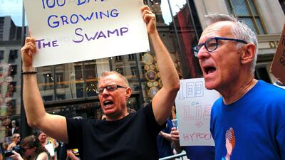 Protesters take part in the '100 Days of Failure' protest in New York on April 29, 2017, to mark the first 100 days of US president Donald Trump's administration. Kena Betancur / AFP