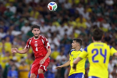 Omar Rekik's headed goal was the only highlight for Tunisia in a heavy defeat to Sweden. AFP