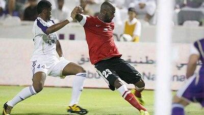 Grafite, in red, scored four times for Al Ahli in their 6-3 victory over defending league champion Al Ain.