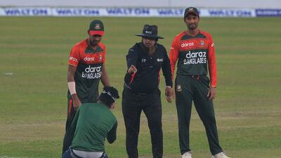 A Bangladesh supporter invades the pitch at the Sher-e-Bangla National Cricket Stadium in Dhaka on Saturday. AFP
