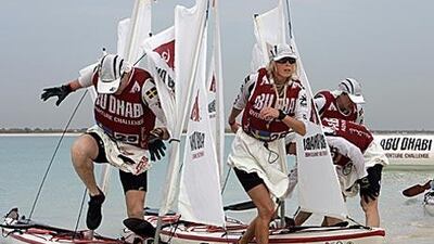 Kristin Larsson, centre, and her teammates compete during the Adventure Challenge in Abu Dhabi.