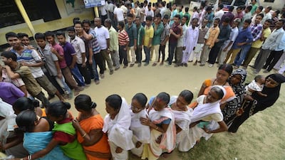 Indian villagers wait in queue to cast their votes at Boginadi polling station, during the first phase of the Indian general election in Lakhimpur district of Assam state, India. EPA