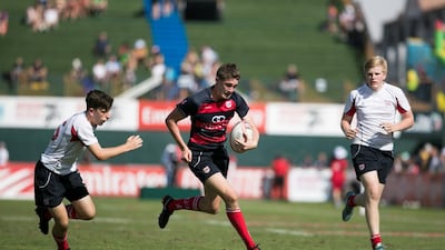 Dubai College first team, in red and black, won the Gulf U19s title at the Dubai Rugby Sevens in 2018, beating he school's second-string side in the final.