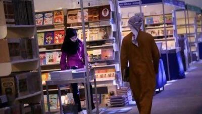 Readers visit the Sharjah International Book Fair at the Sharjah Expo Centre in 2010. Amy Leang / The National