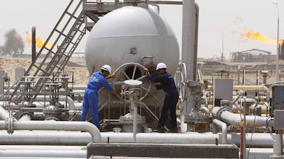 Workers of South Oil Company (SOC) adjust a valve at the Rumaila oil field in Basra Province. North Sea Brent rose to its highest point in about nine months. Atef Hassan / Reuters