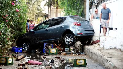 A car and other debris was swept up by a tsunami in Bodrum, Turkey. Yasar Anter / Dogan News Agency via Reuters