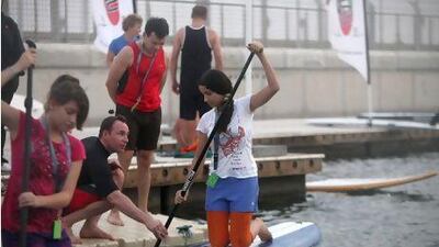 Stand-up paddling is offered free of charge at Yas Marina in Abu Dhabi. Fatima Al Marzooqi / The National
