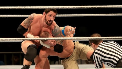 Bad News Barrett, left, in action against John Cena during the WWE's tour of Abu Dhabi last month. Ravindranath / The National