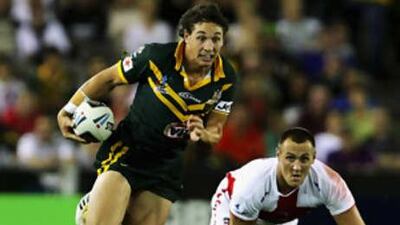 Billy Slater makes a break for Australia against England at the Telstra Dome in Melbourne.