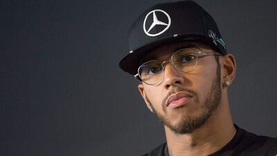 British Formula One driver Lewis Hamilton of Merceds attends a press conference ahead of the new season on Friday. Marijan Murat / EPA / March 11, 2016