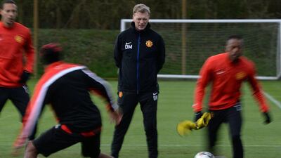Manchester United manager David Moyes watches during a practice session at the club's Carrington training centre in Manchester, northern England, on Tuesday. Nigel Roddis / Reuters / April 8, 2014