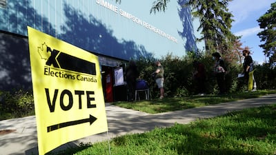 Canadians queue to vote in Toronto, Ontario, in the federal election. Willy Lowry / The National