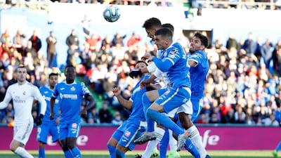 Real Madrid's Raphael Varane scores his team's second goal against Getafe on Saturday. Reuters