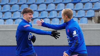 England's James Ward-Prowse, right, with Mason Mount during training. Reuters