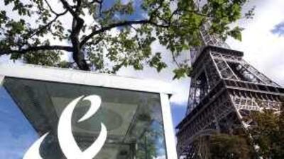 A France Telecom phone booth located at the base of the Eiffel Tower. Work-related stress has been blamed for the unusually high number of suicides at the company.