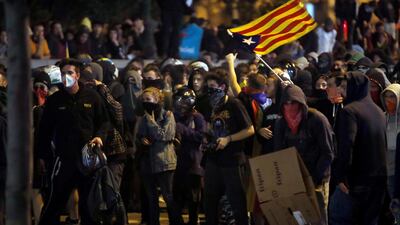 Protesters take part in a protest against the Spanish Supreme Court's ruling of multiple jail terms for pro-independence leaders in Barcelona. EPA