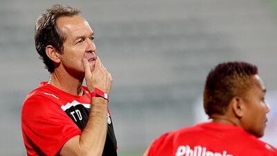 Philippines coach Thomas Dooley, left, looks on during the friendly against Azerbaijan at the Shabab stadium in Dubai on March 5, 2014. Satish Kumar / The National