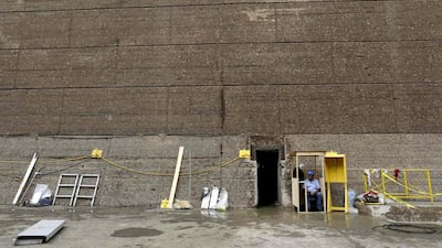 A Panama Canal employee takes a break in a dry chamber of the Miraflores locks during its periodical maintenance. Carlos Jasso / Reuters