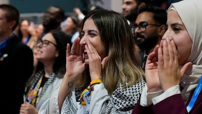 Activists participate in the 'people's plenary' at Cop29 on Thursday in Baku, Azerbaijan. Time is running out for a deal at the talks. Rafiq Maqbool / AP Photo