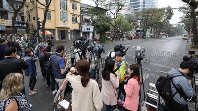 Members of the media stand outside the Melia hotel in Hanoi, Vietnam after Donald Trump arrived. Bloomberg