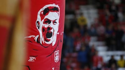 Liverpool fans fly a Steven Gerrard flag before the match. Carl Recine / Reuters
