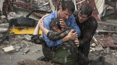 From left, Max Deacon, Richard Armitage and Nathan Kress in Into the Storm. Ron Phillips / Warner Bros Pictures