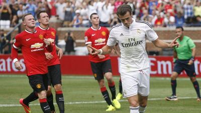 Gareth Bale of Real Madrid celebrates converting a penalty kick against Manchester United during his side's match against them on Saturday at the International Champions Cup in Michigan, US. Duane Burleson / Getty Images / AFP