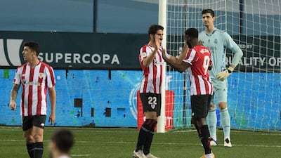 Raul Garcia celebrates with Inaki Williams after scoring against Real Madrid during the Spanish Super Cup semi final. AFP