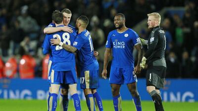 Leicester City players Kasper Schmeichel, right, Robert Huth, Wes Morgan, Danny Simpson and Christian Fuchs celebrate their clean sheet against Liverpool. Jason Cairnduff / Action Images / Reuters
