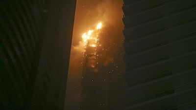 Hundreds were evacuated from the skyscraper, which is 336.1 metres tall and located in the Marina district of the city. Sarah Dea / The National