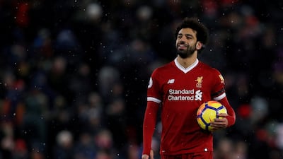Liverpool's Mohamed Salah left with the match ball on Saturday after scoring a hat-trick against Watford. Lee Smith / Action Images via Reuters