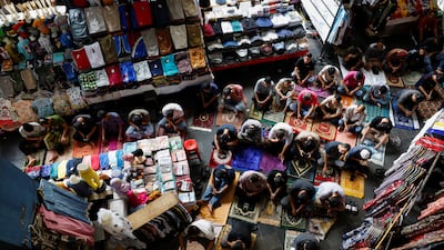 Muslim men gather for Friday prayers at Tanah Abang Textile Market in Jakarta, Indonesia. Reuters