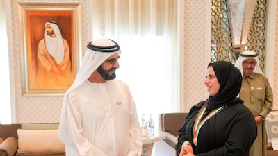 Sheikh Mohammed bin Rashid, Prime Minister and Ruler of Dubai, honours Sheikha Al Nuaimi with the Prime Minister's Award during a UAE Cabinet meeting on Sunday. Wam