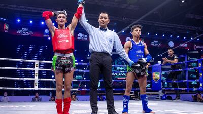 Mohamed Touizi of UAE, red, beat Ahmad Alawasa of Jordan.