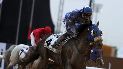 Harry Bentley rides Reda to win the Dubai Kahayla Classic. Karim Sahib / AFP