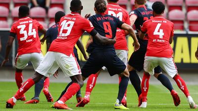 Players awaiting a corner kick during the German Bundesliga match between Mainz and RB Leipzig. EPA