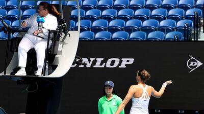 Karolina Pliskova argues with umpire Alison Hughes at Melbourne Park. AFP